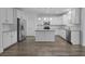 Spacious kitchen with stainless steel appliances, granite countertops, and white cabinets at 470 Gianna Ln, Goose Creek, SC 29445