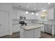 Modern kitchen with stainless steel appliances, granite countertops, and white cabinets at 470 Gianna Ln, Goose Creek, SC 29445