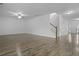 Large living room with stairs features an open floorplan and ceiling fan at 470 Gianna Ln, Goose Creek, SC 29445