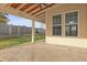 This spacious covered patio with ceiling fan provides a great space for outdoor enjoyment at 470 Gianna Ln, Goose Creek, SC 29445