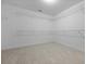 Walk-in closet with carpeted floor and white shelving units at 470 Gianna Ln, Goose Creek, SC 29445