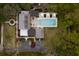 Bird's eye view of a home with a pool, jacuzzi, fire pit and patio at 478 Huger St, Charleston, SC 29403