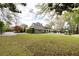 Expansive backyard with a pool and lush lawn, perfect for relaxation and outdoor activities at 478 Huger St, Charleston, SC 29403