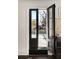 Dark balcony door with glass windows that leads to a balcony and lets in natural light at 478 Huger St, Charleston, SC 29403