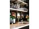 Stylish bar area with marble countertops, open shelving, and designer finishes at 478 Huger St, Charleston, SC 29403