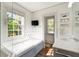 Elegant bathroom with a soaking tub, marble countertops, and stylish fixtures at 478 Huger St, Charleston, SC 29403