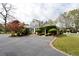 Long driveway and rear exterior view with a pool providing a grand entrance and outdoor amenities at 478 Huger St, Charleston, SC 29403