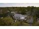 Aerial view of a stone house with a pool and a lush backyard at 478 Huger St, Charleston, SC 29403