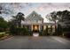 Attractive home exterior with a long driveway and manicured landscaping, creating a welcoming entrance at 478 Huger St, Charleston, SC 29403