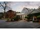 Charming front yard with a lush garden, featuring well-maintained landscaping and a private driveway at 478 Huger St, Charleston, SC 29403