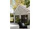 Charming stone garage with dark doors, detailed trim, and surrounding landscaping for added appeal at 478 Huger St, Charleston, SC 29403
