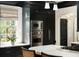 Modern kitchen features stainless steel appliances and dark cabinetry at 478 Huger St, Charleston, SC 29403