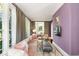 Comfortable living area with large windows, soft lighting, a velvet sofa, and stylish decor at 478 Huger St, Charleston, SC 29403