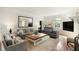 Open living room features stylish decor, a cozy rug, and ample natural light at 478 Huger St, Charleston, SC 29403