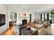 Bright and airy living room featuring a fireplace, hardwood floors, and neutral decor at 478 Huger St, Charleston, SC 29403