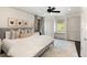 Bright main bedroom featuring a ceiling fan, neutral decor, and ample closet space at 478 Huger St, Charleston, SC 29403