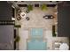 Aerial view of the luxurious patio featuring a spa, pool, fire pit, and outdoor seating at 478 Huger St, Charleston, SC 29403