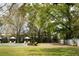 Inviting pool area with lounge chairs, umbrellas, and manicured greenery, ideal for leisure and entertainment at 478 Huger St, Charleston, SC 29403