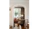 Sitting room featuring neutral decor and an arched doorway to another living space at 478 Huger St, Charleston, SC 29403