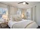 Bright bedroom with a ceiling fan, large windows, and neutral-toned decor at 5 Kracke St # A, Charleston, SC 29403