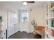 Cozy bedroom with a ceiling fan, hardwood floors, built-in bookshelves, and closet at 5 Kracke St # A, Charleston, SC 29403