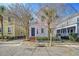 Charming two-story home with a welcoming front entrance and mature trees at 5 Kracke St # A, Charleston, SC 29403