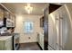 Modern kitchen featuring stainless steel appliances, contrasting cabinets, and sleek countertops at 5 Kracke St # A, Charleston, SC 29403