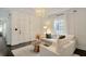 Cozy living room featuring neutral tones, lots of light, and modern decor at 5 Kracke St # A, Charleston, SC 29403