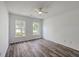 Bright bedroom features two windows and hardwood floors at 5033 Thornton Dr, Summerville, SC 29485
