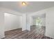 Bright, open room showcasing modern flooring, neutral walls, and an open layout, ideal for entertaining at 5033 Thornton Dr, Summerville, SC 29485