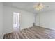 Spacious main bedroom with white walls, wood look floors, and ensuite bathroom access at 5033 Thornton Dr, Summerville, SC 29485