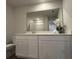 Bathroom featuring a white vanity with a large mirror and flower accents at 5108 Double Eagle Lp, Summerville, SC 29485