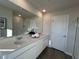 Bright bathroom featuring dual sink vanity with white cabinets and quartz countertops at 5108 Double Eagle Lp, Summerville, SC 29485