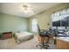 Bedroom with neutral colored walls featuring ceiling fan, carpeted floor and a window for plenty of natural light at 529 Beverly Dr, Summerville, SC 29485