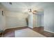 Bedroom with wooden floor and carpet, featuring ceiling fan and a window allowing natural light at 529 Beverly Dr, Summerville, SC 29485