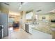 Spacious kitchen with stainless steel dishwasher and an open view of dining area at 529 Beverly Dr, Summerville, SC 29485