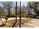 Charming home with an attached garage, captured from across the street on a tranquil, tree-lined road at 643 Edmonds Dr, Charleston, SC 29412