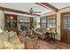 Inviting living room with exposed beams, brick fireplace, and comfortable seating at 643 Edmonds Dr, Charleston, SC 29412