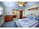 Comfortable bedroom with a metal frame bed, carpeted floors, and access to the bathroom at 643 Edmonds Dr, Charleston, SC 29412