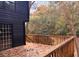 Wooden back deck with views of wooded backyard at 6464 St Anthony Dr, Hollywood, SC 29449