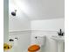 Cozy bathroom featuring a white toilet, sink, and white walls with black fixtures at 6464 St Anthony Dr, Hollywood, SC 29449