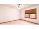 Bright bedroom with natural light from a window and a ceiling fan for added comfort at 6464 St Anthony Dr, Hollywood, SC 29449