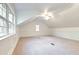 Large bonus room featuring fresh paint, carpet, and wainscotting that would make a great flex space at 6464 St Anthony Dr, Hollywood, SC 29449