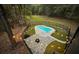 Aerial view of the in-ground pool, patio, and fire pit at 6464 St Anthony Dr, Hollywood, SC 29449