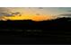 Beautiful sunset view from the property overlooking trees and water at 6464 St Anthony Dr, Hollywood, SC 29449