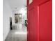 Welcoming foyer area with a bold red front door, tile flooring, and access to the living space at 683 Edmonds Dr, Charleston, SC 29412