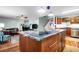 Open-concept kitchen with a large island overlooking the living area at 683 Edmonds Dr, Charleston, SC 29412