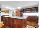 Spacious kitchen with stainless steel appliances, an island, and ample cabinet space at 683 Edmonds Dr, Charleston, SC 29412
