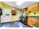 A laundry room with washer and dryer, utility sink, and cabinet storage at 683 Edmonds Dr, Charleston, SC 29412