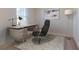 Home office space with a contemporary desk, comfortable chair, and ample natural light at 700 Pisces Ln, Summerville, SC 29486